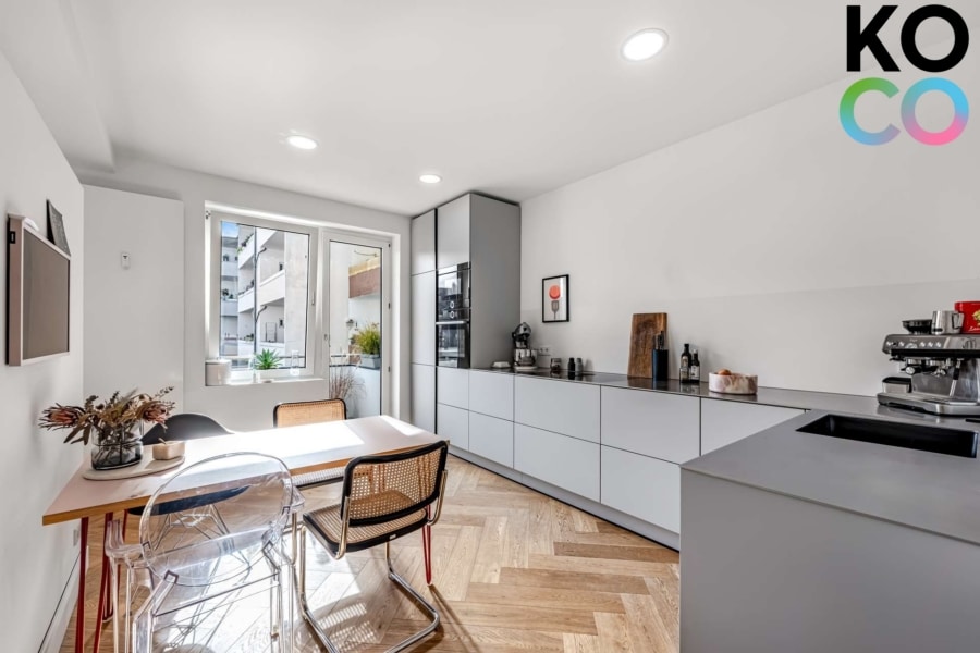 Küche und Essbereich - Exklusives Zuhause in zentraler Lage: 3-Zimmer-Wohnung mit Balkon