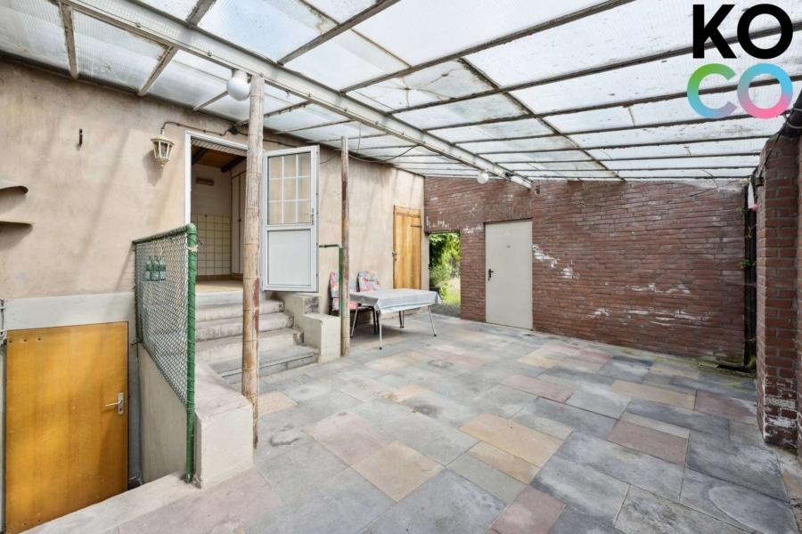 Überdachter Innenhof - Ein Haus – viele Möglichkeiten: Wohnen, vermieten oder neu bauen im beliebten Neusser Stadionviertel