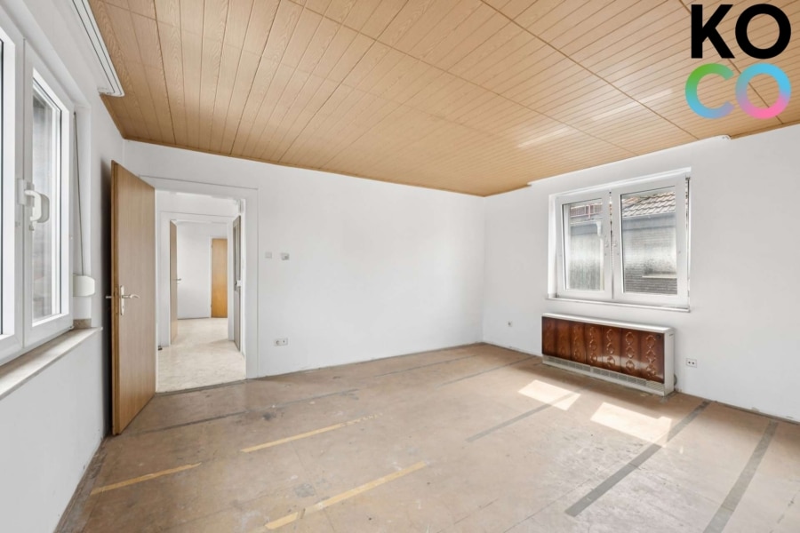 Wohnzimmer - Ein Haus – viele Möglichkeiten: Wohnen, vermieten oder neu bauen im beliebten Neusser Stadionviertel