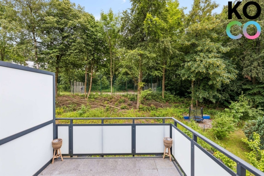Balkon mit Blick auf den Stadtpark